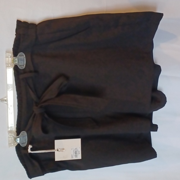 Lauren Conrad Black shorts. Bow tied ruffle waist in front, elastic in back - Picture 1 of 4